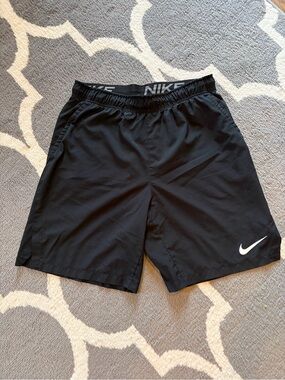 Nike Black Athletic Shorts with White Swoosh